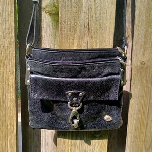 Black Leather Bags with Metallic Accents